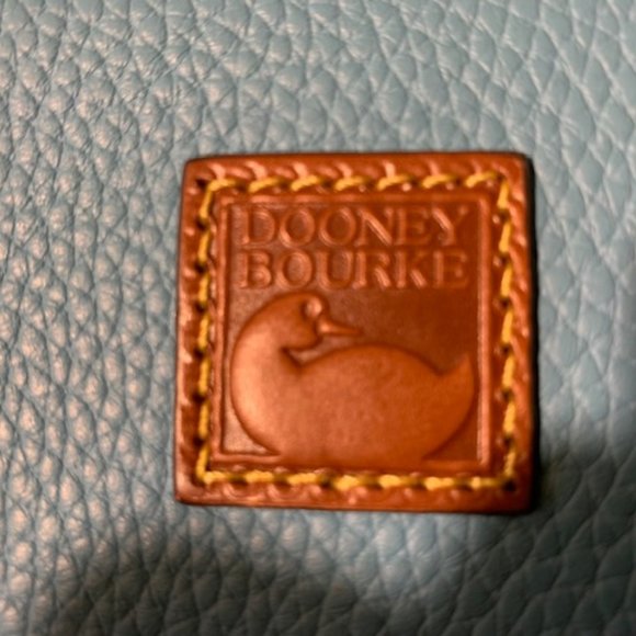 A medium size Dooney backpack in turquoise. main image 5